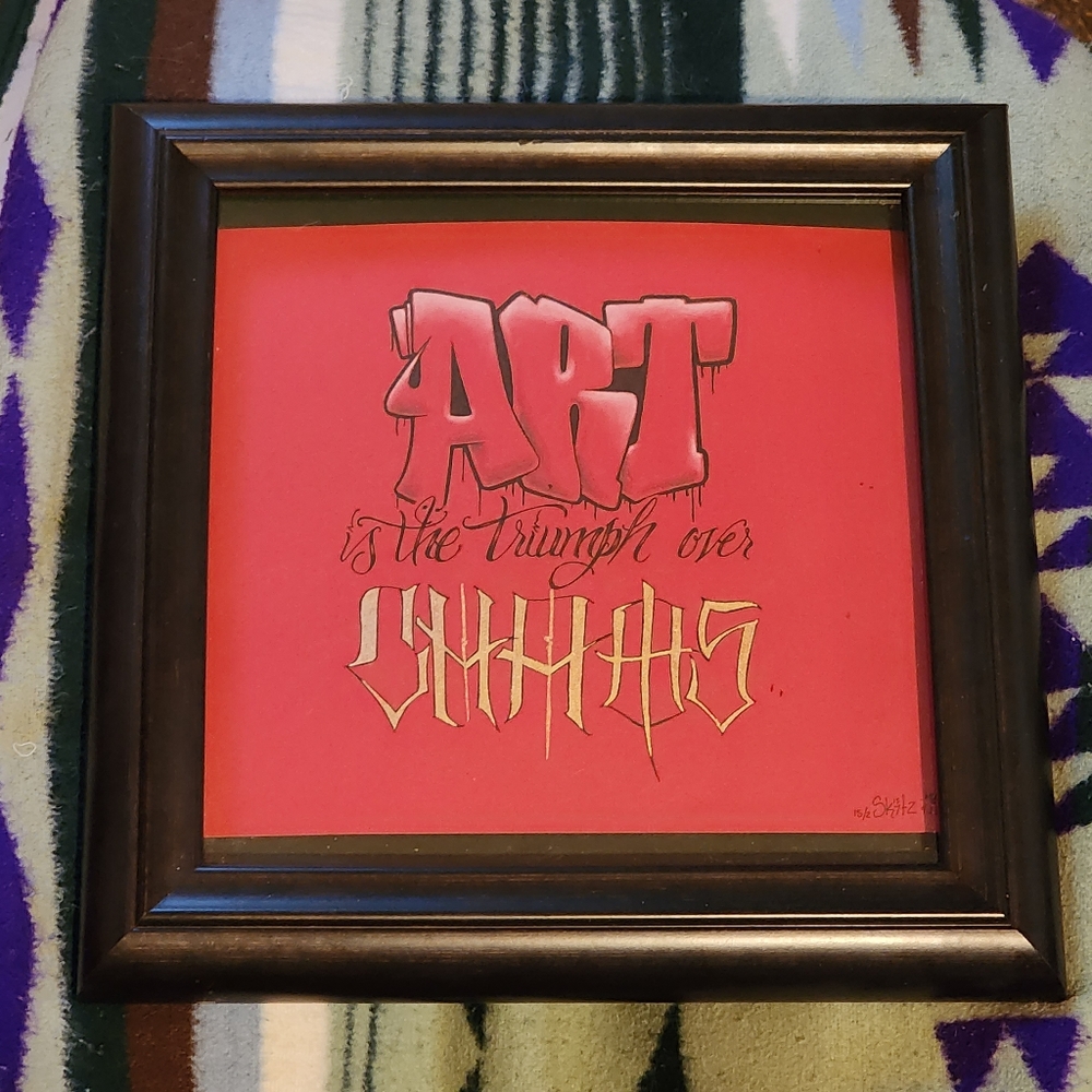 Original art in wooden fram